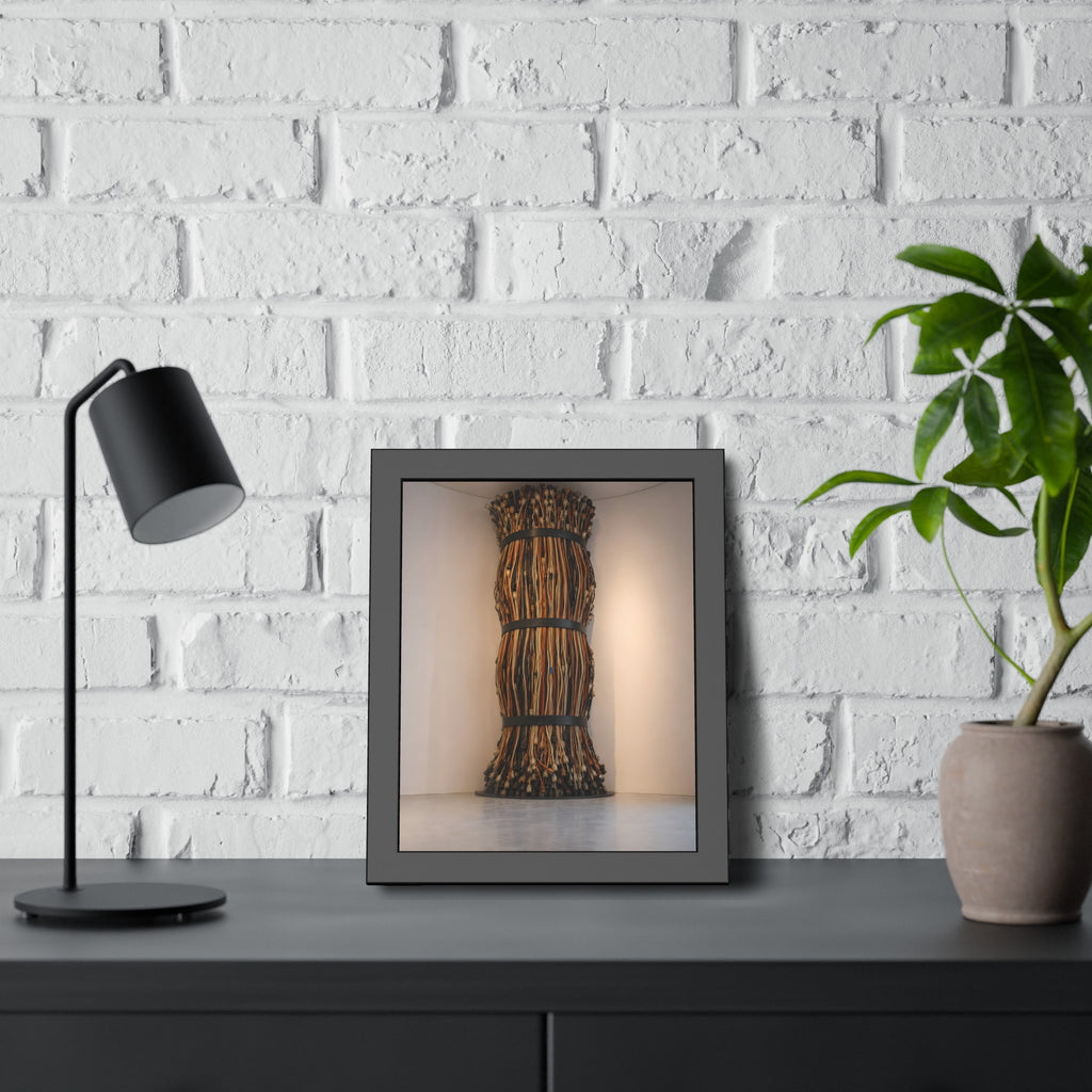 A tall column of bundled cords strapped in three places in a gallery corner. The Bundled Apse by Garabaggio, framed fine art print hanging in a room.