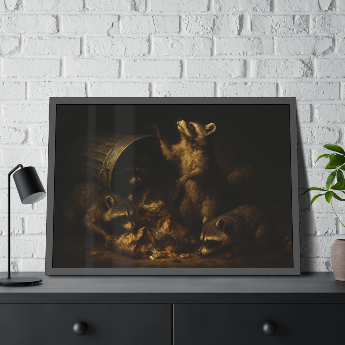 Raccoons around a fallen trash can, one rearing up with a raised paw. The Supper of Shadows by Garabaggio, framed fine art print hanging in a room.